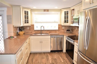 If when you think FLORIDA, you think surf, ocean, sand and the on Sunrise Lakes Phase III in Florida - for sale on GolfHomes.com, golf home, golf lot