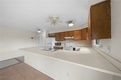 Affordable Waterfront Gem with 99 Feet of Waterfrontage and on Royal Tee Country Club in Florida - for sale on GolfHomes.com, golf home, golf lot