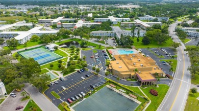 LOOK NO FURTHER! Rarely available first-floor unit with a on On Top Of The World Golf Course in Florida - for sale on GolfHomes.com, golf home, golf lot