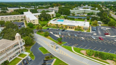 LOOK NO FURTHER! Rarely available first-floor unit with a on On Top Of The World Golf Course in Florida - for sale on GolfHomes.com, golf home, golf lot
