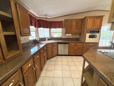 Listed by the Official Sales Team of Cypress Lakes Village on Big Cypress Golf and Country Club in Florida - for sale on GolfHomes.com, golf home, golf lot