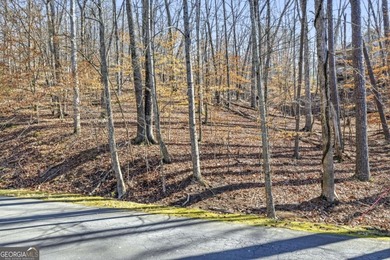 Seasonal lake views and just steps from the water! This 0 on The Highlands Course at Lake Arrowhead in Georgia - for sale on GolfHomes.com, golf home, golf lot