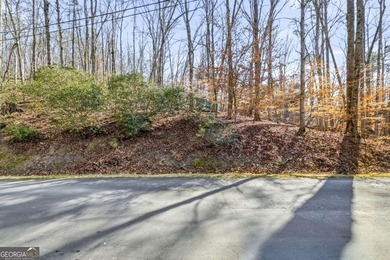 Seasonal lake views and just steps from the water! This 0 on The Highlands Course at Lake Arrowhead in Georgia - for sale on GolfHomes.com, golf home, golf lot