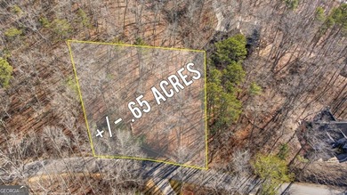 Seasonal lake views and just steps from the water! This 0 on The Highlands Course at Lake Arrowhead in Georgia - for sale on GolfHomes.com, golf home, golf lot