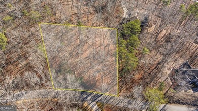 Seasonal lake views and just steps from the water! This 0 on The Highlands Course at Lake Arrowhead in Georgia - for sale on GolfHomes.com, golf home, golf lot