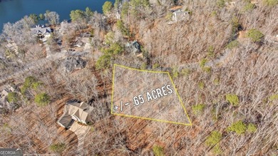 Seasonal lake views and just steps from the water! This 0 on The Highlands Course at Lake Arrowhead in Georgia - for sale on GolfHomes.com, golf home, golf lot