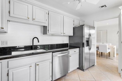 Welcome to this beautiful property destined to become your oasis on Quail Ridge Golf Course and Country Club in Florida - for sale on GolfHomes.com, golf home, golf lot