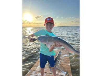 Exceptional waterfront lot in a prestigious gated community! on Cedar Creek Country Club in Texas - for sale on GolfHomes.com, golf home, golf lot