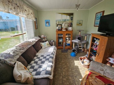 This 1997 Palm Harbor, 2-bedroom 2 bath home boasts 1,800 square on Big Cypress Golf and Country Club in Florida - for sale on GolfHomes.com, golf home, golf lot