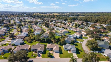 PRICE REDUCTION *** Impeccably maintained Amarillo (aka Banyan on The Links of Spruce Creek in Florida - for sale on GolfHomes.com, golf home, golf lot