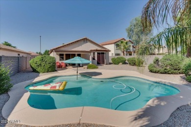 This charming home, situated on the 11th tee box of the on Greenfield Lakes Golf Club in Arizona - for sale on GolfHomes.com, golf home, golf lot