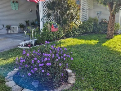 This 1997 Palm Harbor, 2-bedroom 2 bath home boasts 1,800 square on Big Cypress Golf and Country Club in Florida - for sale on GolfHomes.com, golf home, golf lot