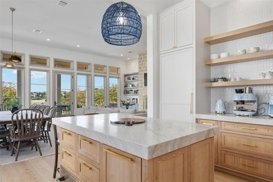 This beautiful lake house was built in 2024 and is nestled in on Long Cove Golf Course in Texas - for sale on GolfHomes.com, golf home, golf lot