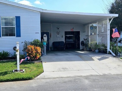 This 1997 Palm Harbor, 2-bedroom 2 bath home boasts 1,800 square on Big Cypress Golf and Country Club in Florida - for sale on GolfHomes.com, golf home, golf lot