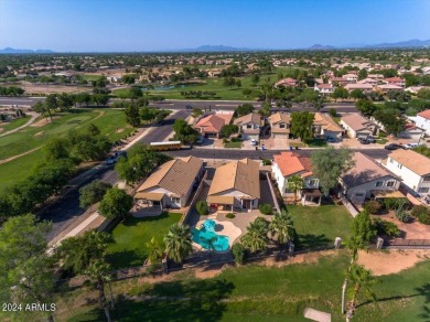 This charming home, situated on the 11th tee box of the on Greenfield Lakes Golf Club in Arizona - for sale on GolfHomes.com, golf home, golf lot