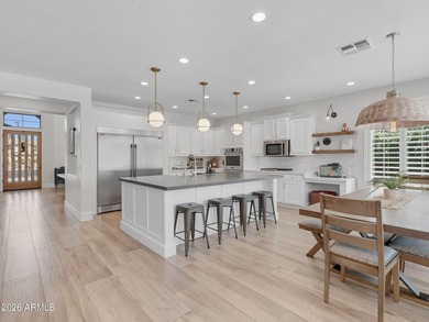 Experience elevated desert luxury in the prestigious and highly on Seville Golf and Country Club in Arizona - for sale on GolfHomes.com, golf home, golf lot