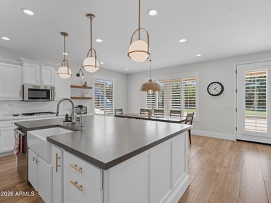 Experience elevated desert luxury in the prestigious and highly on Seville Golf and Country Club in Arizona - for sale on GolfHomes.com, golf home, golf lot