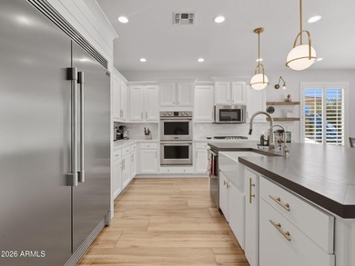 Experience elevated desert luxury in the prestigious and highly on Seville Golf and Country Club in Arizona - for sale on GolfHomes.com, golf home, golf lot