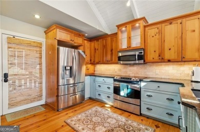 This unique 3 BR / 2 BATH villa sits directly on the edge of on Big Canoe Golf Club - Cherokee in Georgia - for sale on GolfHomes.com, golf home, golf lot