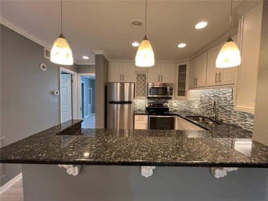 Golf Course Viewe see this fully updated condo in this highly on On Top Of The World Golf Course in Florida - for sale on GolfHomes.com, golf home, golf lot