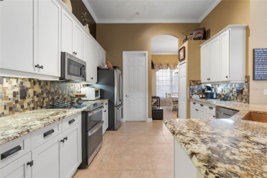 Welcome to your private oasis in the highly sought-after gated on Plantation Bay Golf and Country Club in Florida - for sale on GolfHomes.com, golf home, golf lot