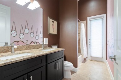 Welcome to your private oasis in the highly sought-after gated on Plantation Bay Golf and Country Club in Florida - for sale on GolfHomes.com, golf home, golf lot