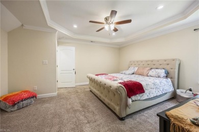 This charming Cape Cod features luxury vinyl plank flooring in on Oceanview Golf Course in Virginia - for sale on GolfHomes.com, golf home, golf lot