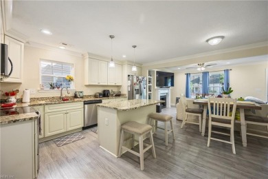 This charming Cape Cod features luxury vinyl plank flooring in on Oceanview Golf Course in Virginia - for sale on GolfHomes.com, golf home, golf lot