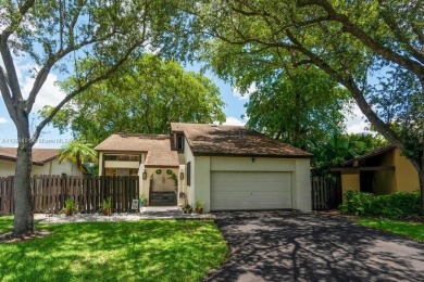 Unique location w/gorgeous park & lake views!The best of the on Calusa Country Club in Florida - for sale on GolfHomes.com, golf home, golf lot