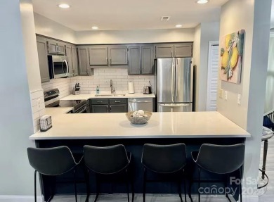 Beautifully updated 2 bedroom, 2 bath Quail Cove Townhome with on Rumbling Bald Resort on Lake Lure in North Carolina - for sale on GolfHomes.com, golf home, golf lot