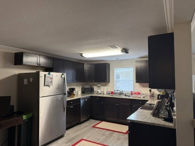 Beautifully Renovated 2-Bedroom, 2-Bath Double Wide Home in on Rolling Greens Executive Golf Community in Florida - for sale on GolfHomes.com, golf home, golf lot