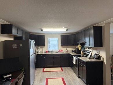 Beautifully Renovated 2-Bedroom, 2-Bath Double Wide Home in on Rolling Greens Executive Golf Community in Florida - for sale on GolfHomes.com, golf home, golf lot