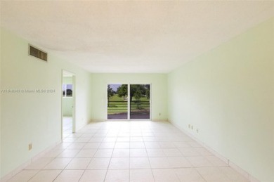 Welcome to your dream condo in Davie! This stunning unit on Davie Golf Club in Florida - for sale on GolfHomes.com, golf home, golf lot