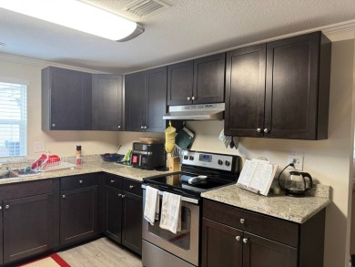 Beautifully Renovated 2-Bedroom, 2-Bath Double Wide Home in on Rolling Greens Executive Golf Community in Florida - for sale on GolfHomes.com, golf home, golf lot