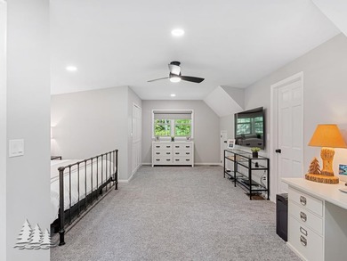 Tucked within the Garland Golf Resort, this beautifully updated on Garland Resort and Golf Club  in Michigan - for sale on GolfHomes.com, golf home, golf lot