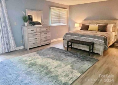 Beautifully updated 2 bedroom, 2 bath Quail Cove Townhome with on Rumbling Bald Resort on Lake Lure in North Carolina - for sale on GolfHomes.com, golf home, golf lot