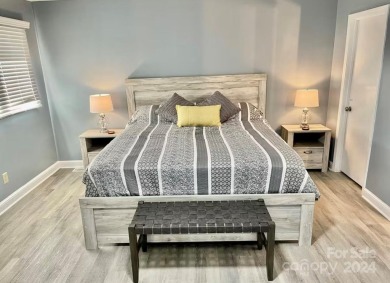 Beautifully updated 2 bedroom, 2 bath Quail Cove Townhome with on Rumbling Bald Resort on Lake Lure in North Carolina - for sale on GolfHomes.com, golf home, golf lot