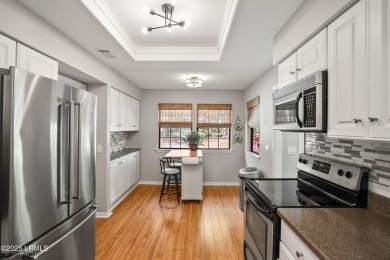 Experience the charm and tranquility of life in this beautifully on Dataw Island Club in South Carolina - for sale on GolfHomes.com, golf home, golf lot