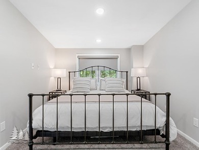 Tucked within the Garland Golf Resort, this beautifully updated on Garland Resort and Golf Club  in Michigan - for sale on GolfHomes.com, golf home, golf lot