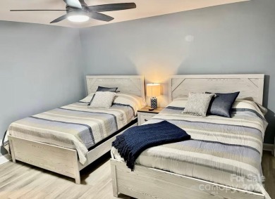 Beautifully updated 2 bedroom, 2 bath Quail Cove Townhome with on Rumbling Bald Resort on Lake Lure in North Carolina - for sale on GolfHomes.com, golf home, golf lot