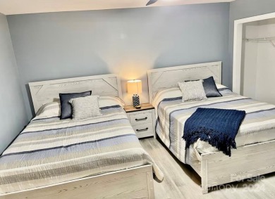 Beautifully updated 2 bedroom, 2 bath Quail Cove Townhome with on Rumbling Bald Resort on Lake Lure in North Carolina - for sale on GolfHomes.com, golf home, golf lot