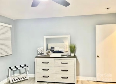 Beautifully updated 2 bedroom, 2 bath Quail Cove Townhome with on Rumbling Bald Resort on Lake Lure in North Carolina - for sale on GolfHomes.com, golf home, golf lot