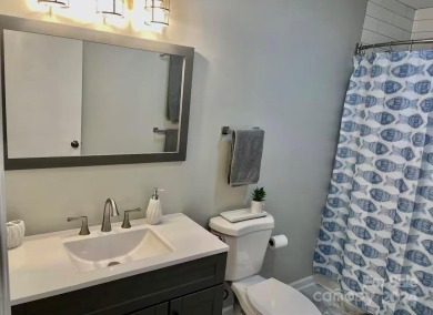 Beautifully updated 2 bedroom, 2 bath Quail Cove Townhome with on Rumbling Bald Resort on Lake Lure in North Carolina - for sale on GolfHomes.com, golf home, golf lot