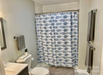 Beautifully updated 2 bedroom, 2 bath Quail Cove Townhome with on Rumbling Bald Resort on Lake Lure in North Carolina - for sale on GolfHomes.com, golf home, golf lot