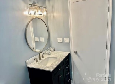 Beautifully updated 2 bedroom, 2 bath Quail Cove Townhome with on Rumbling Bald Resort on Lake Lure in North Carolina - for sale on GolfHomes.com, golf home, golf lot