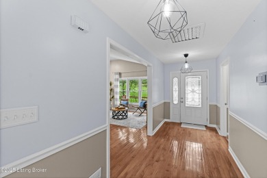 Discover serene, nature-filled living in this updated ranch home on Doe Valley Country Club in Kentucky - for sale on GolfHomes.com, golf home, golf lot
