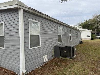 Beautifully Renovated 2-Bedroom, 2-Bath Double Wide Home in on Rolling Greens Executive Golf Community in Florida - for sale on GolfHomes.com, golf home, golf lot