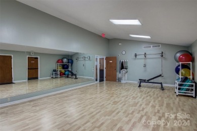 Beautifully updated 2 bedroom, 2 bath Quail Cove Townhome with on Rumbling Bald Resort on Lake Lure in North Carolina - for sale on GolfHomes.com, golf home, golf lot