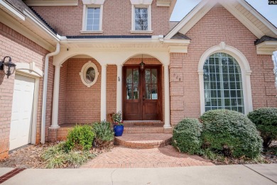 This beautiful brick lakefront home in Timberlake Estates has on Timberlake Country Club in South Carolina - for sale on GolfHomes.com, golf home, golf lot