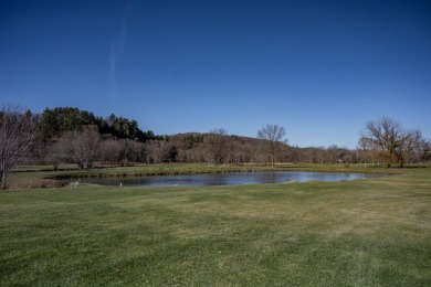 Attention golf enthusiasts! This well-known and ideally located on Spring Valley Golf Course, Inc in Wisconsin - for sale on GolfHomes.com, golf home, golf lot
